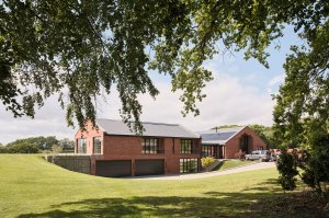 exterior view at the brick barn by hapa architects, modern, house overlooking fields