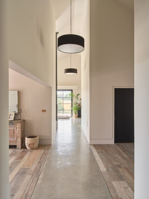 interior and corridoor at brick barn by hapa architects, polished concrete floor, white plater walls, double height ceilings, modern,, contemporary